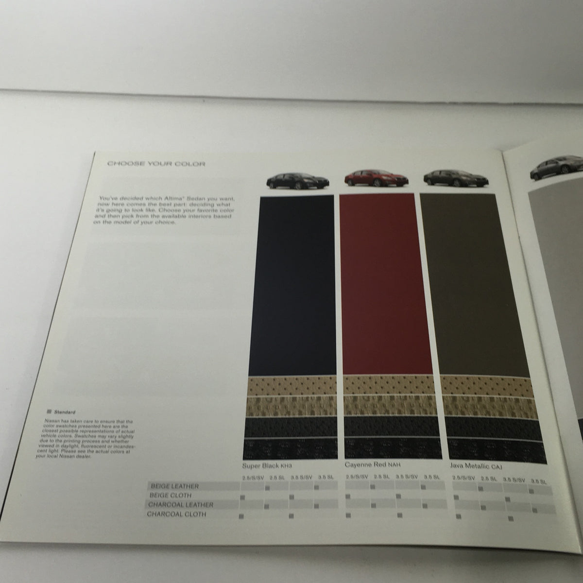 Interactive color options page from the 2015 Nissan Altima Sedan Dealership Car Auto Brochure Catalog featuring different color choices for the vehicle's interior and exterior.
