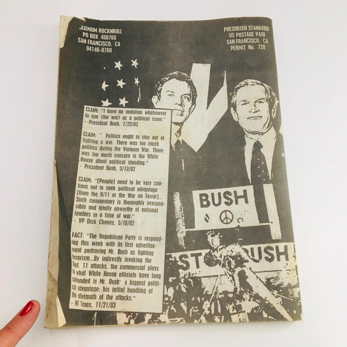 Cover of Maximum RocknRoll Magazine January 2004 #248 displaying political themes and commentary. The cover features a striking design with prominent figures and references to the political climate, indicative of the magazine's critical perspective on society.