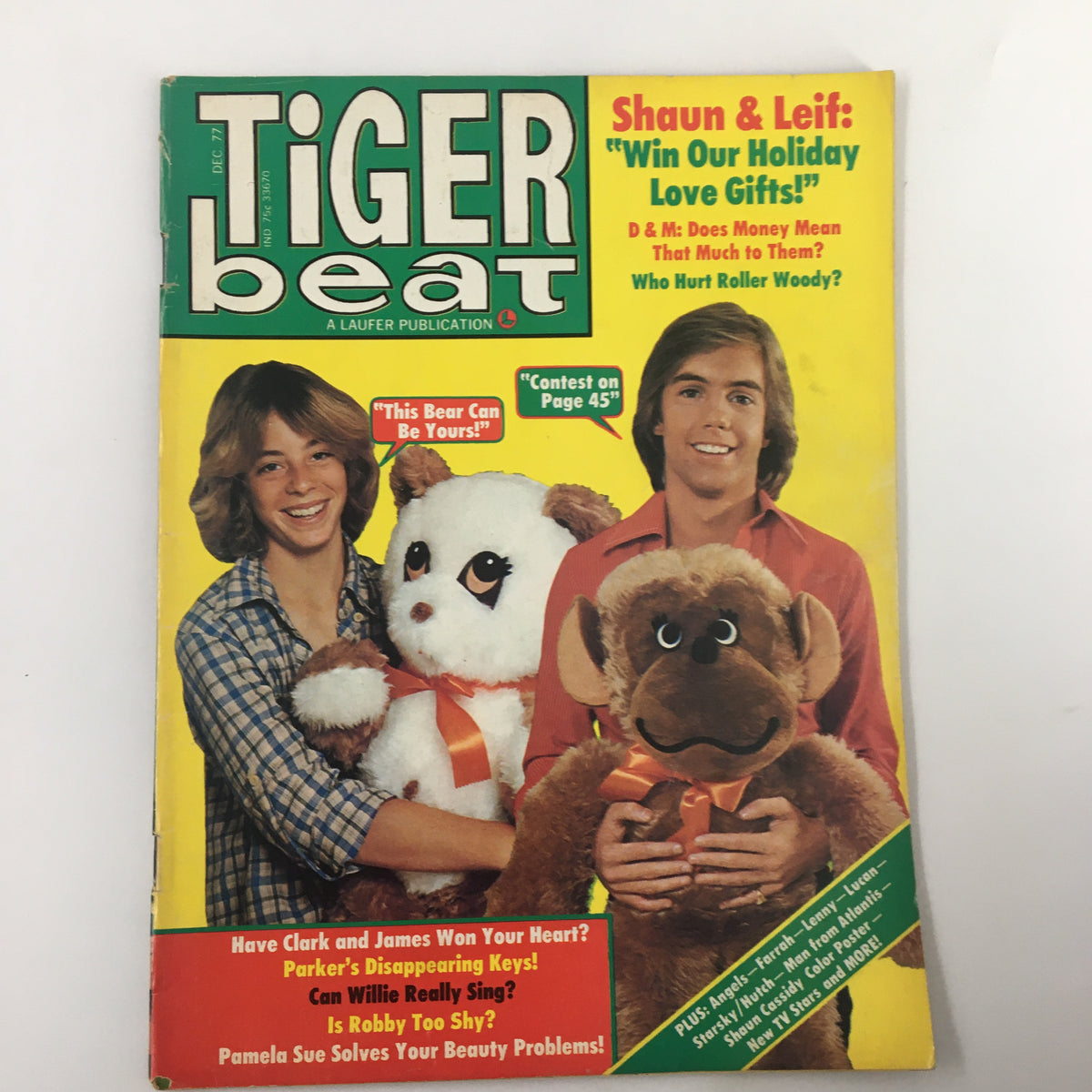 VTG Tiger Beat Magazine December 1977 featuring Shaun Cassidy and Leif Garrett on the cover, showcasing them with plush toys and colorful graphics, a collectible from the golden era of teen fandom.