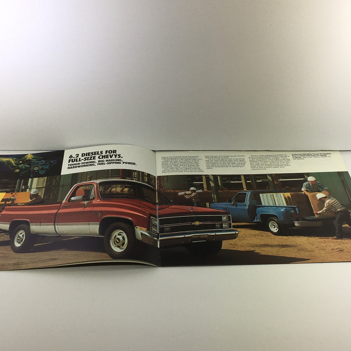 Page from the 1983 Chevrolet Full-Size Pickup Dealership Car Auto Brochure Catalog showcasing diesel trucks and features in action.