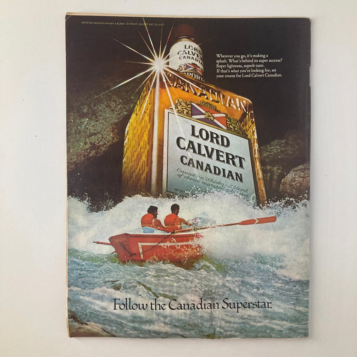 Cover of vintage advertisement featuring Lord Calvert Canadian whiskey, highlighting outdoor adventure with a scenic waterfall background and the tagline 'Follow the Canadian Superstar'.