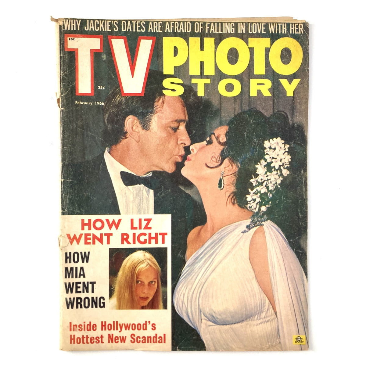 February 1966 VTG TV Photo Story Magazine cover featuring a romantic scene with Elizabeth Taylor and a male actor, highlighting classic Hollywood glamour.