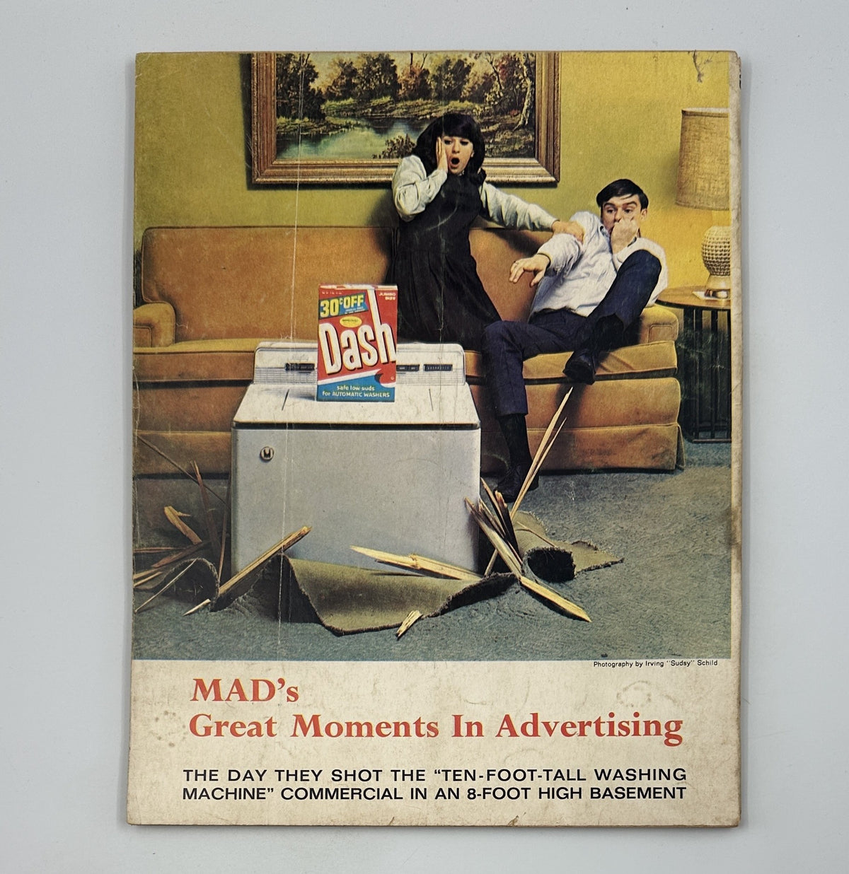 Cover of MAD Magazine's Fifth Annual Collection 1967 titled 'MAD's Great Moments In Advertising'. The cover displays a humorous scene with a man and a woman interacting with a washing machine, highlighting the comedic style of MAD magazine.