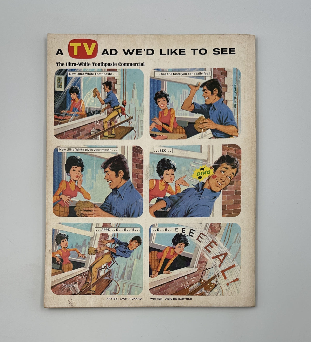 Back cover of MAD Magazine Super Special No. 11 illustrating a humorous Ultra-White Toothpaste commercial featuring characters engaging in a lighthearted scene.