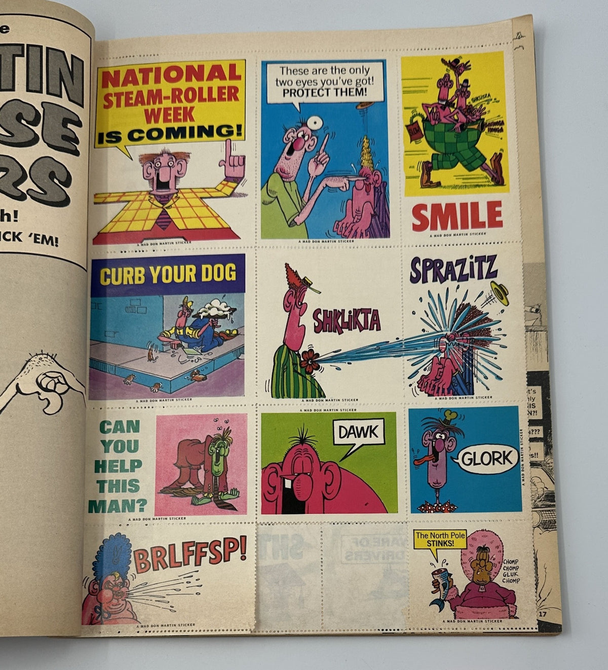 MAD Magazine Super Special No. 10 1973 page featuring Don Martin Nonsense Stickers, including humorous cartoon characters urging actions like 'Curb Your Dog' and 'Smile'.