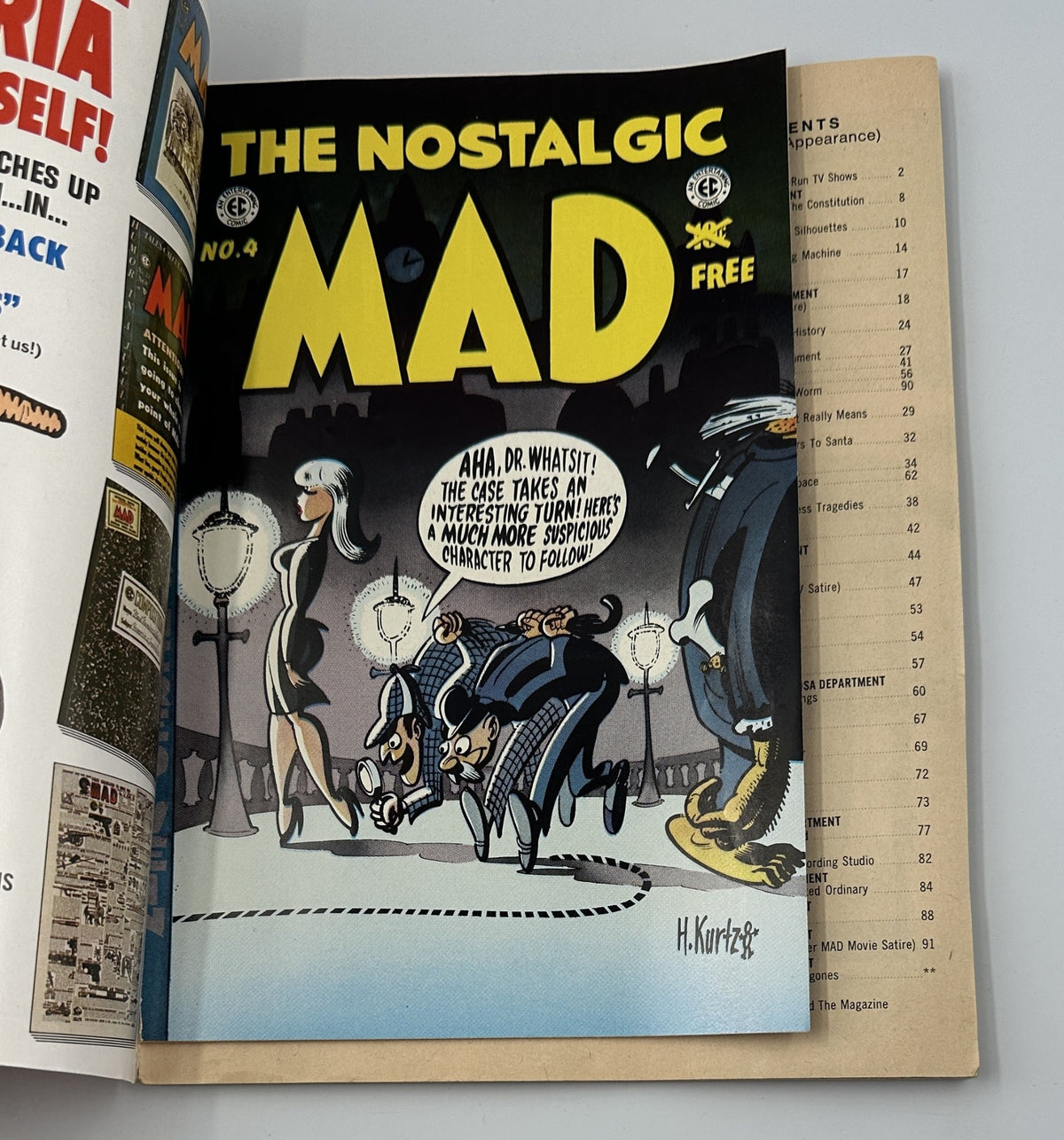 Another inside page of MAD Magazine No. 18, titled 'The Nostalgic MAD', featuring a comic style illustration of characters in a humorous setting.