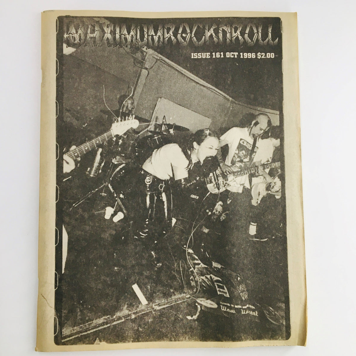 Cover of Maximum RocknRoll Magazine October 1996 Issue #161 featuring a punk band performance, showcasing the vibrant underground punk scene of the mid-90s.