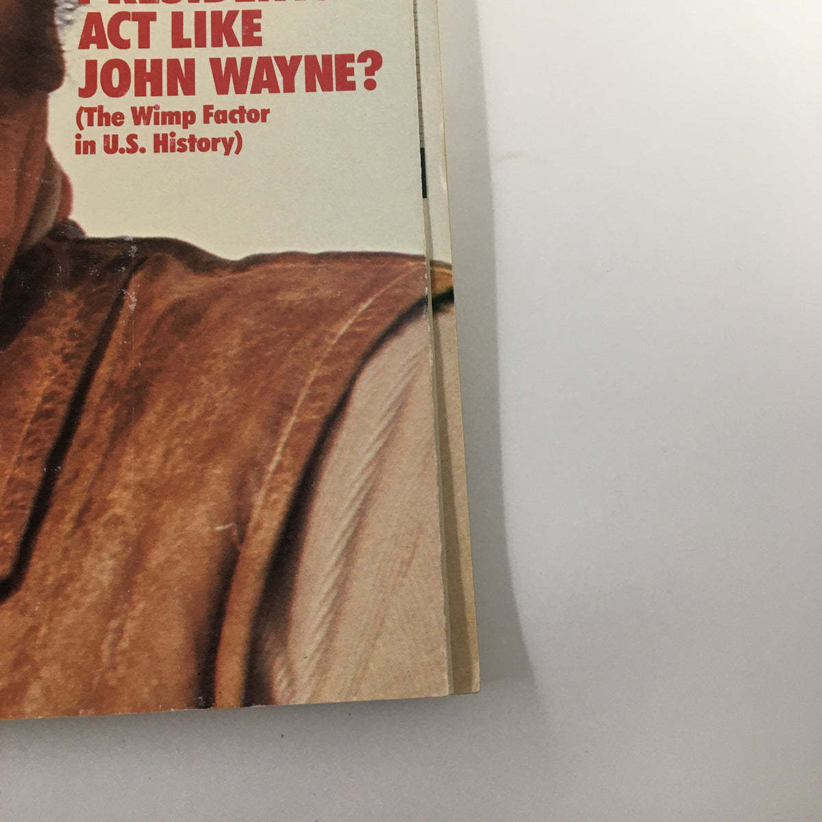 Close-up view of the cover of American Heritage Magazine November 1989 highlighting the question, 'Must all our presidents act like John Wayne?', part of the 'Wimp Factor' discourse.
