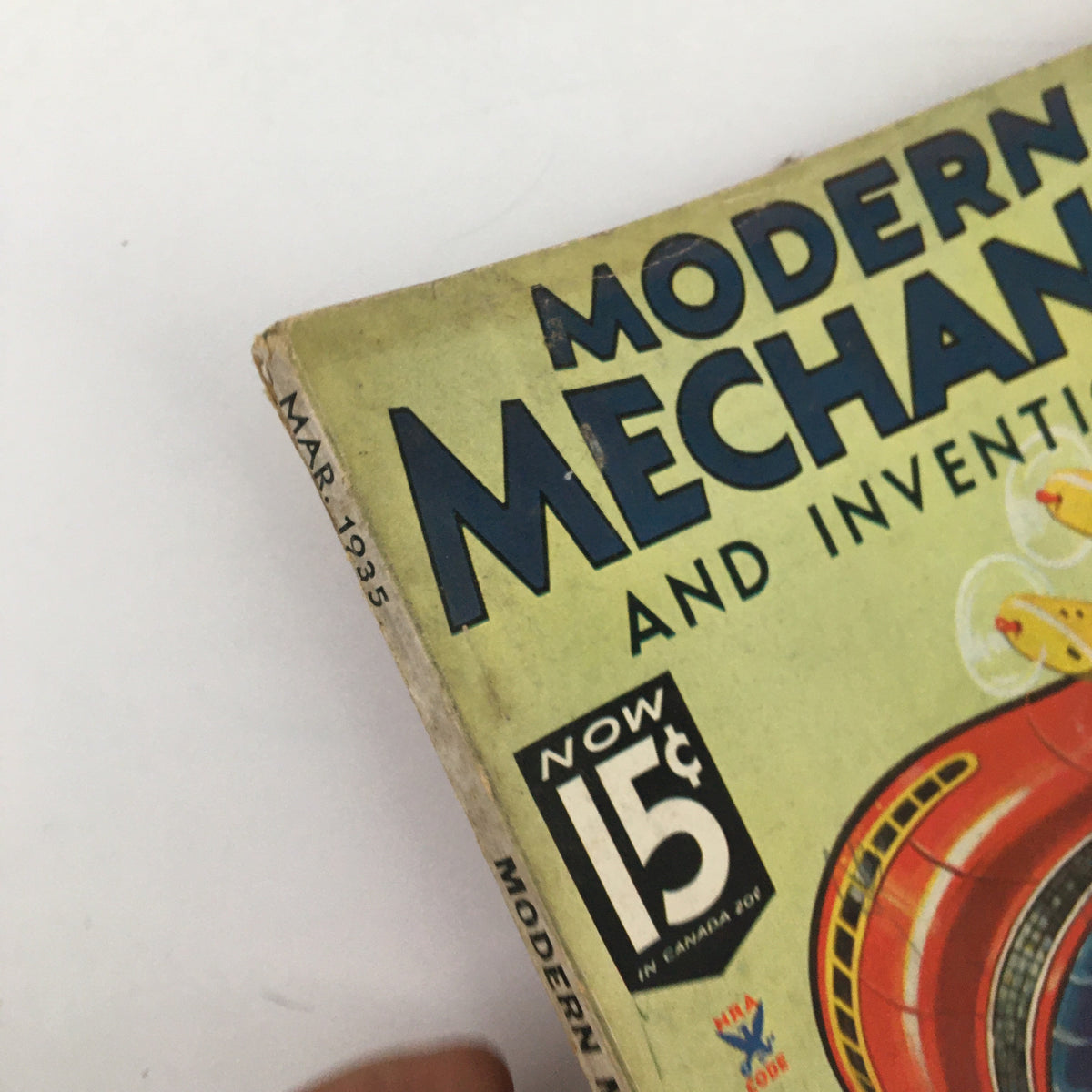 Close-up of the top corner of the VTG Modern Mechanix Magazine March 1935 showing the date and price of the magazine.