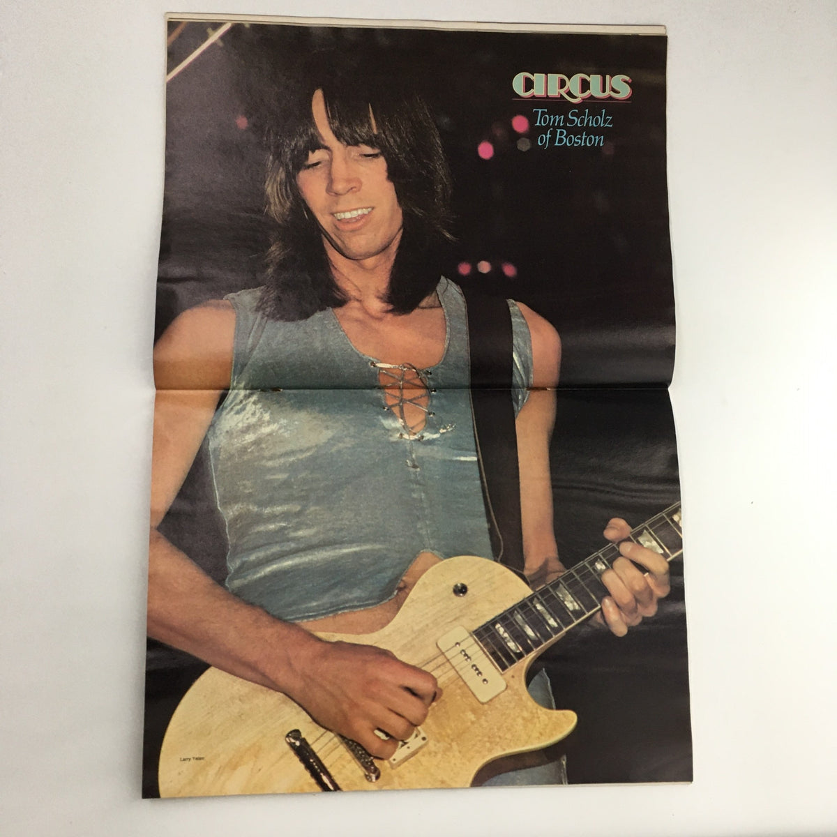 Interior poster of Circus Magazine June 9, 1977, showcasing Tom Scholz of Boston in a performance, highlighting his influence in the rock music scene.
