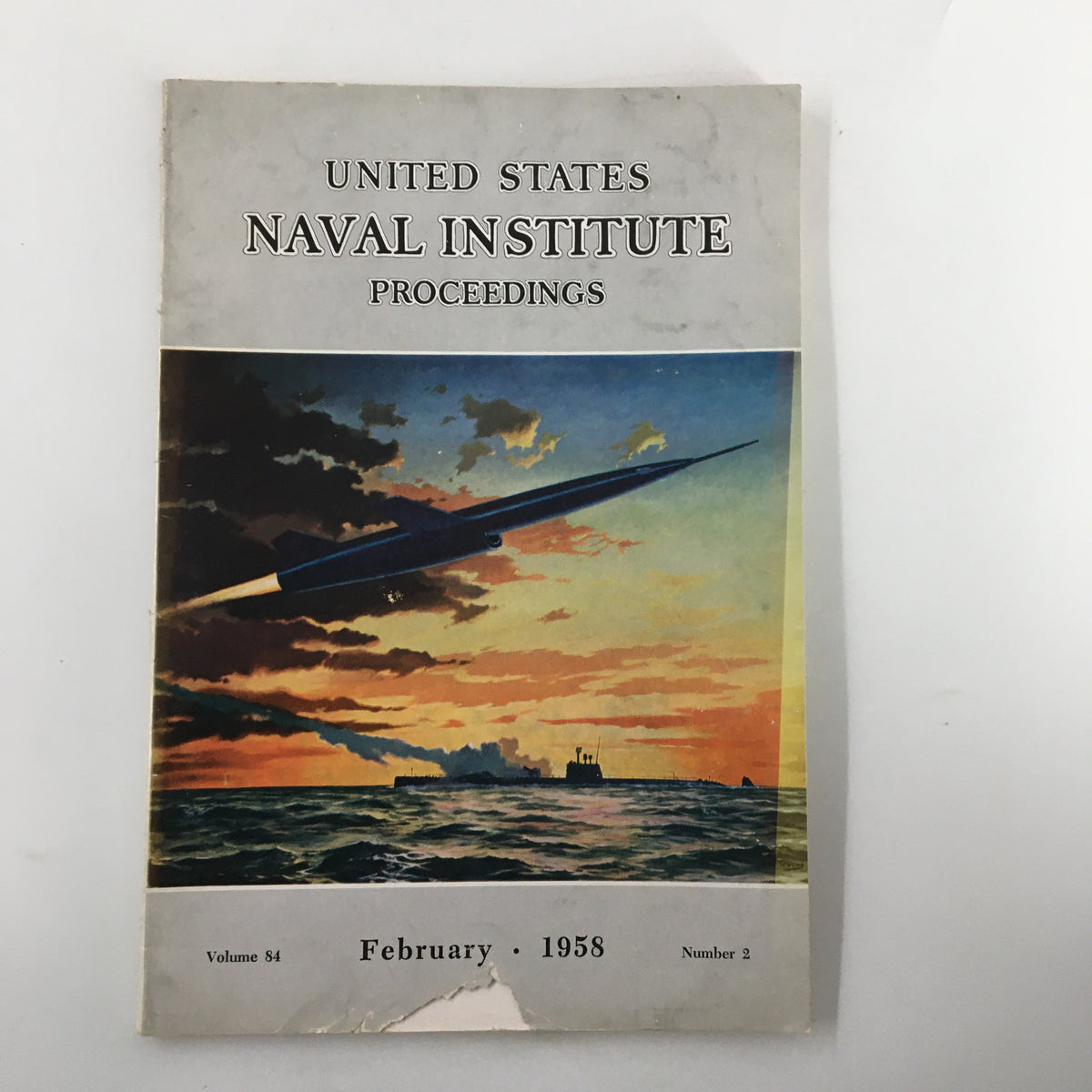 Vintage United States Naval Institute Proceedings magazine cover from February 1958, featuring dramatic artwork of a missile and a sunset over the ocean.