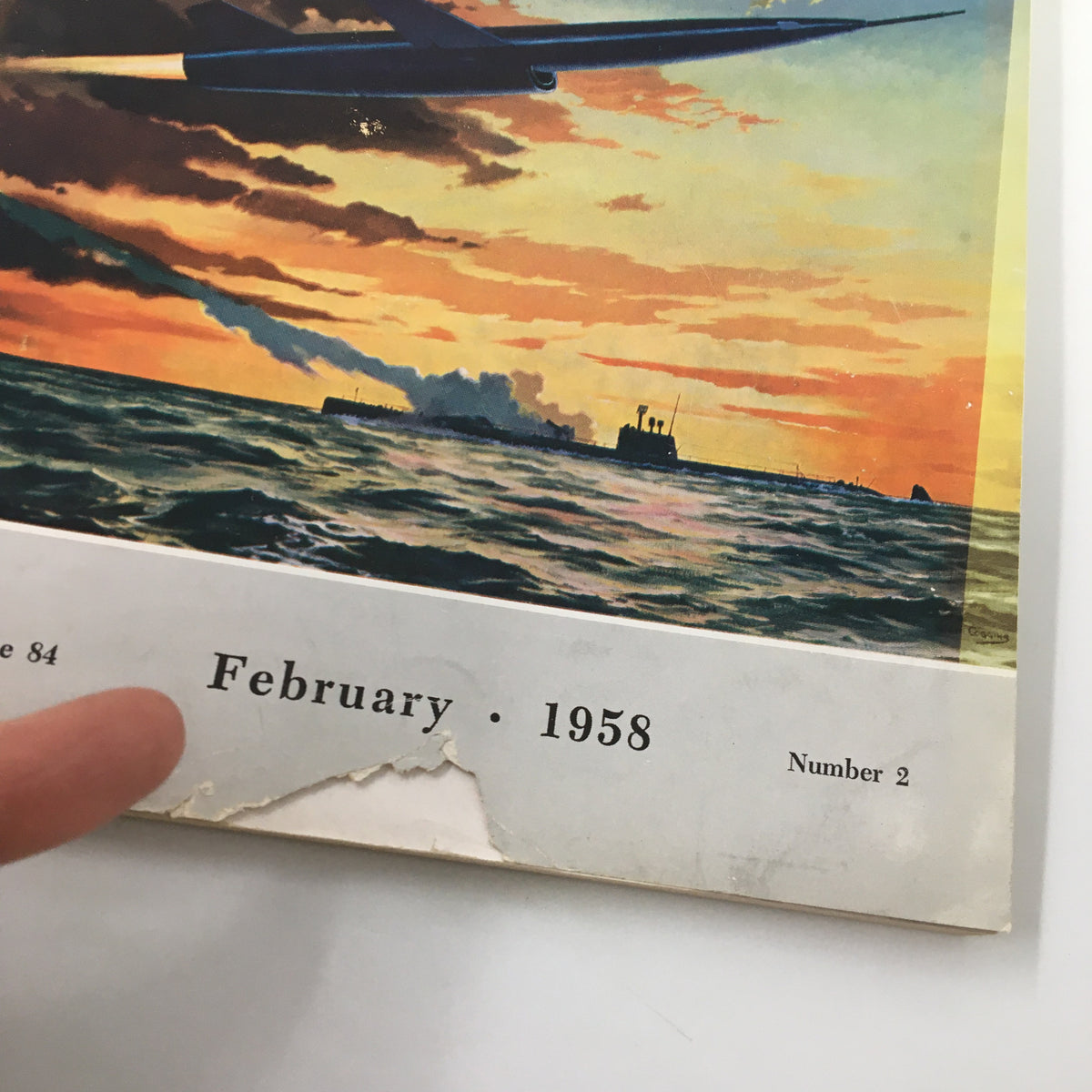 Cover of the vintage magazine United States Naval Institute Proceedings, February 1958, featuring a sunset over the ocean and ships, emphasizing the title 'The Battle of Pips.'