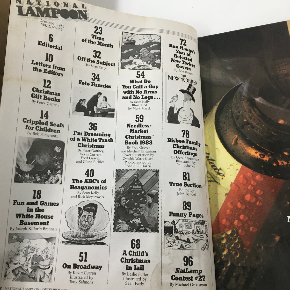 Vintage National Lampoon Humor Magazine December 1983, featuring a table of contents with comedic articles and illustrations, showcasing the humor style of the era. Includes titles like 'Time of the Month,' 'I'm Dreaming of a White Trash Christmas,' and 'A Child's Christmas in Jail.'