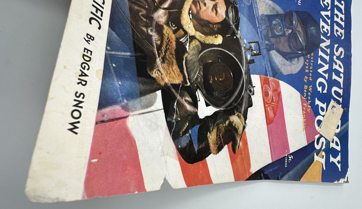 Close-up view of the cover of The Saturday Evening Post Magazine May 31, 1941, highlighting the WWII Pacific theme and the article 'Showdown in the Pacific' by Edgar Snow, with a soldier in a fur-lined jacket holding a camera.