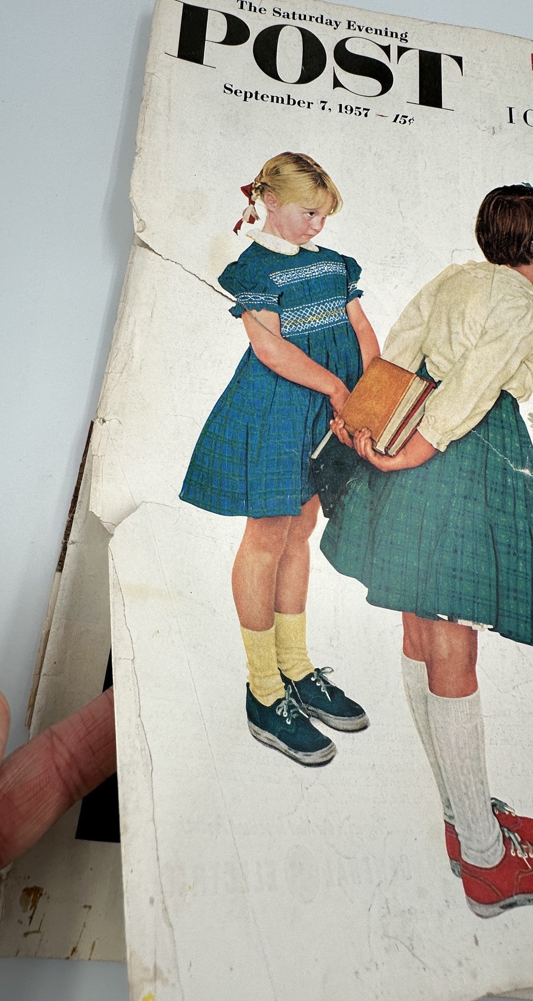 Cover image of Saturday Evening Post Magazine from September 7, 1957, featuring two young girls in 1950s attire, one with a missing front tooth, showcasing the nostalgic style of that era.