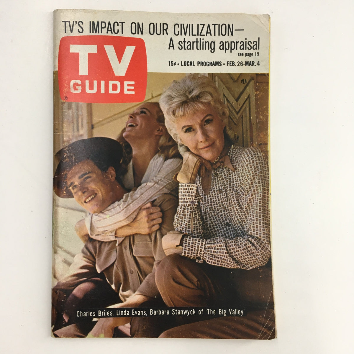 TV Guide Magazine February 26 1966 cover featuring Charles Briles, Linda Evans, and Barbara Stanwyck, highlighting TV's cultural impact.