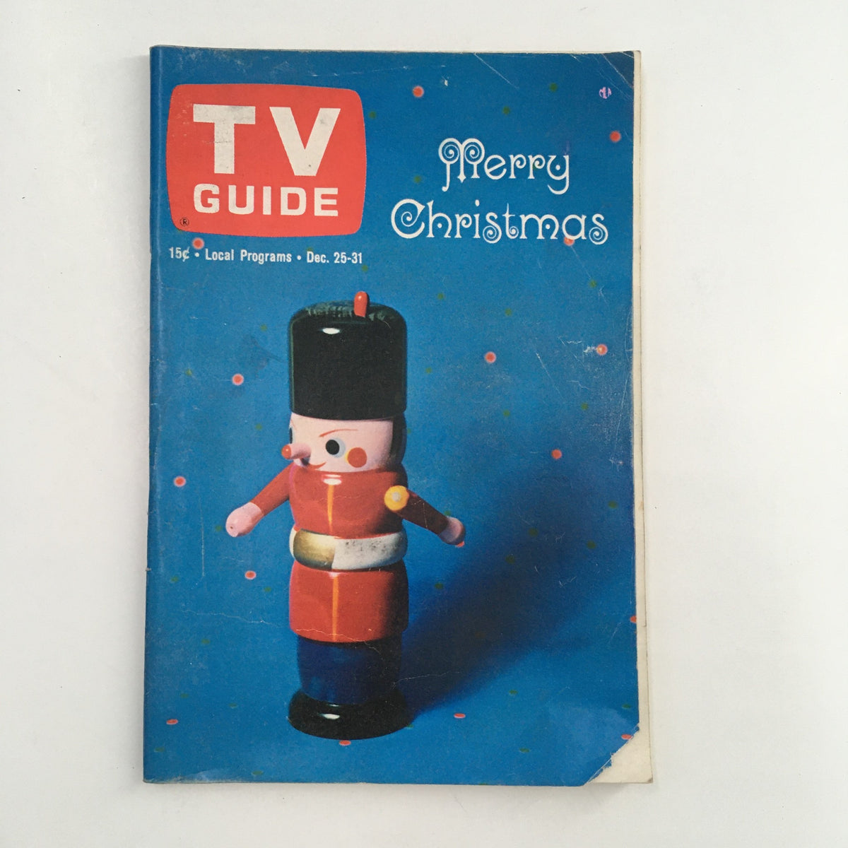 Cover of TV Guide Magazine December 25 1965 featuring a colorful nutcracker toy design by William Woods.