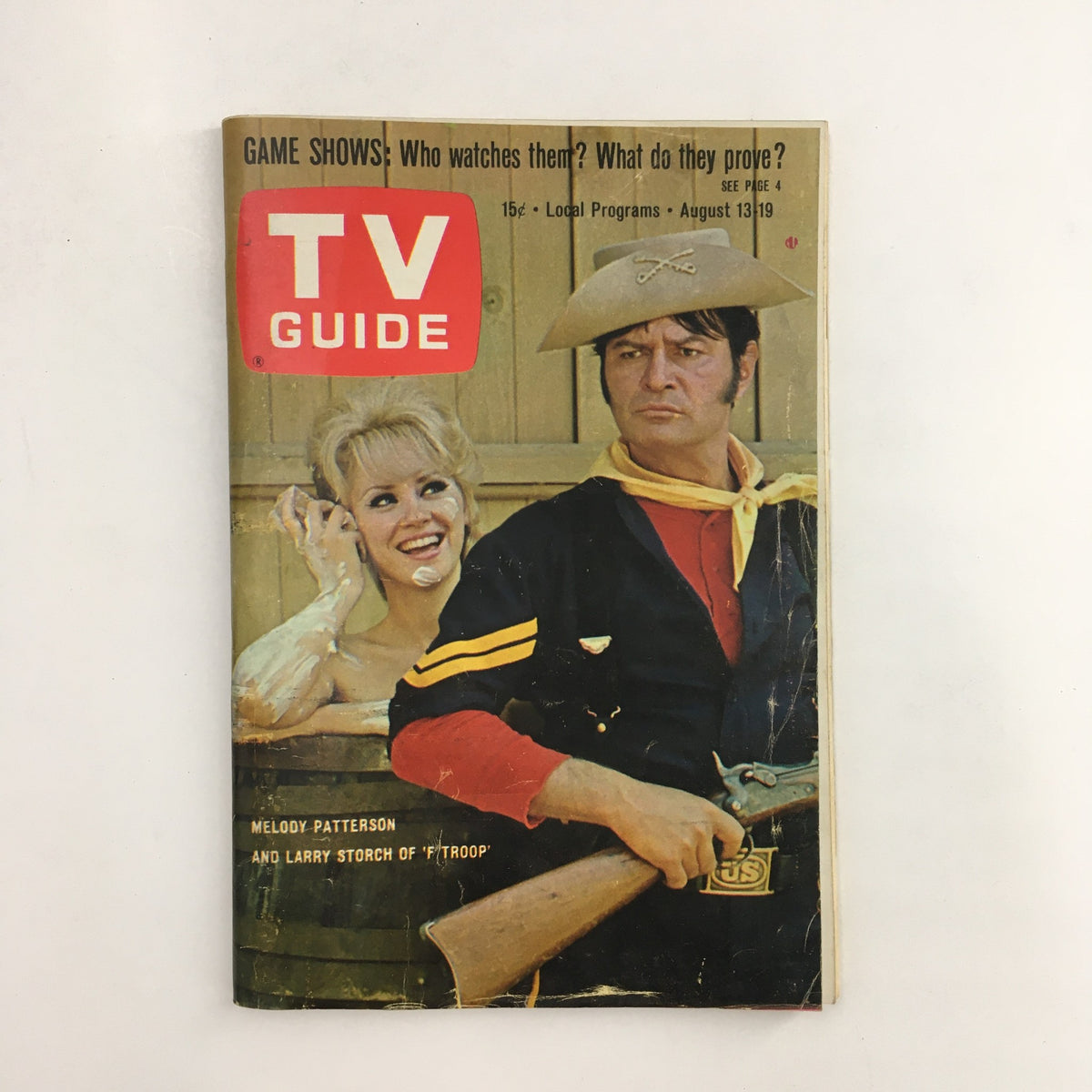 Cover of TV Guide Magazine August 13, 1966 featuring Melody Patterson and Larry Storch from 'F Troop'. This vintage magazine highlights classic television with a nostalgic design.