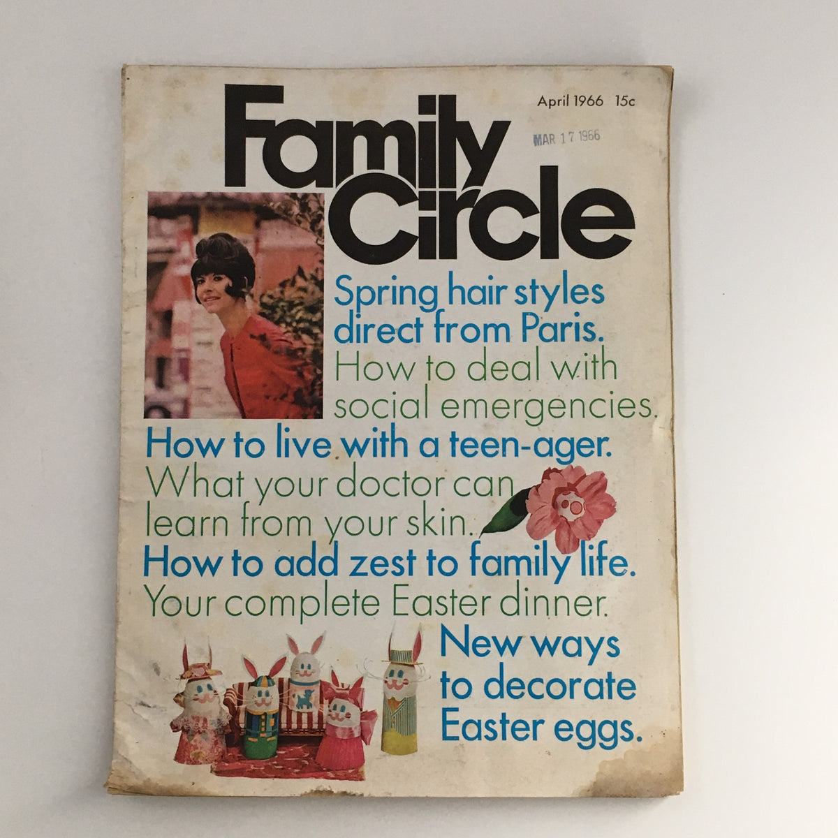 April 1966 Family Circle Magazine cover featuring Spring hair styles direct from Paris, along with articles on social emergencies, teen life, and Easter dinner planning. The magazine showcases a vintage aesthetic.