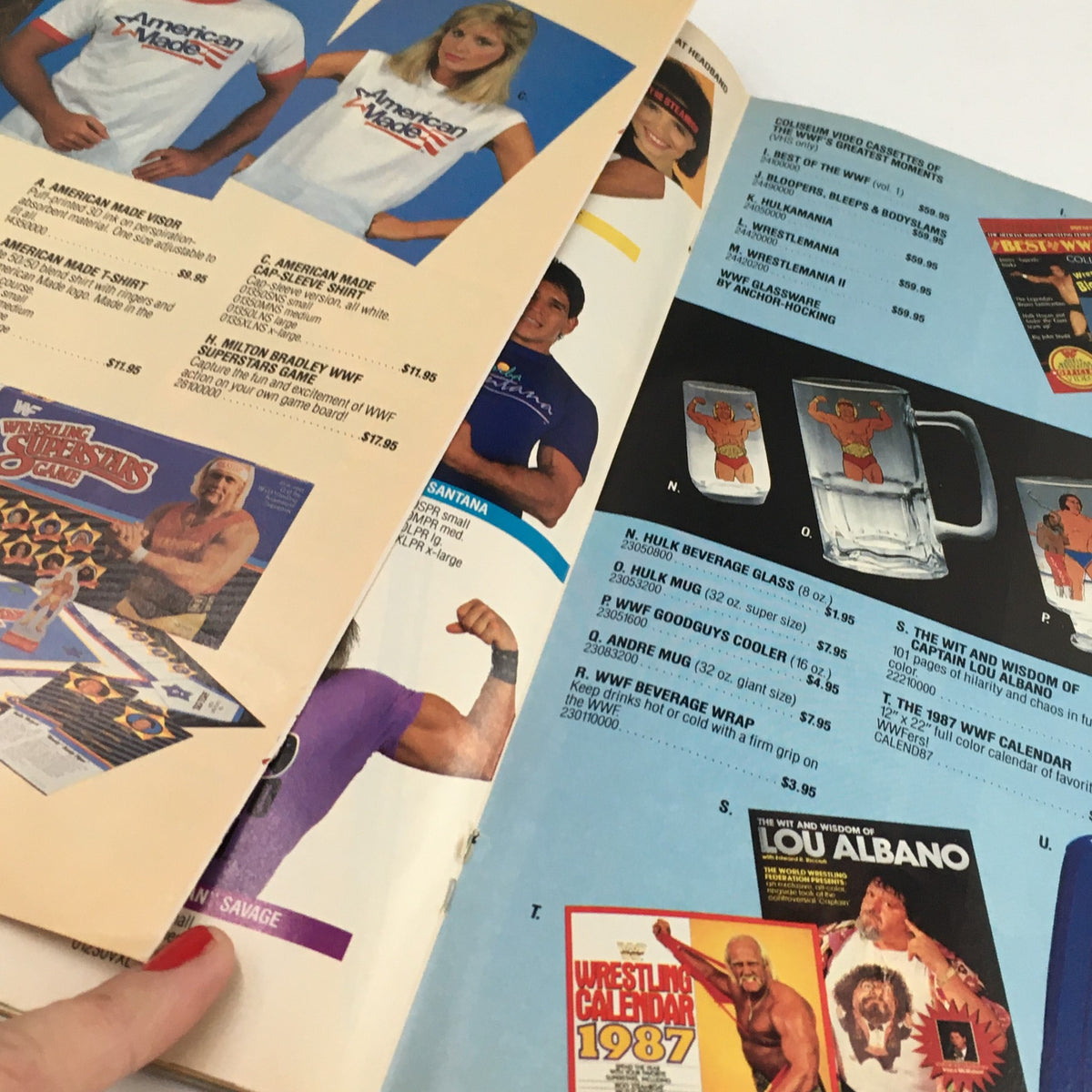 WWF Magazine December 1986 image of merchandise advertisements featuring wrestling-themed products such as shirts and mugs, highlighting the memorabilia popular in professional wrestling culture.