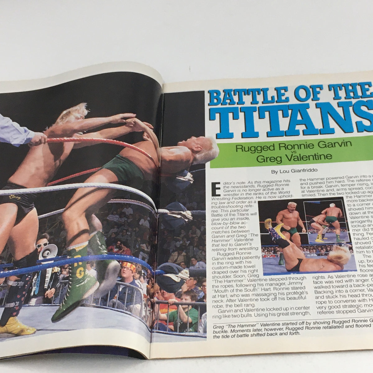 Insightful article titled 'Battle of the Titans' from WWF Magazine July 1989, detailing a wrestling match between Rugged Ronnie Garvin and Greg Valentine.