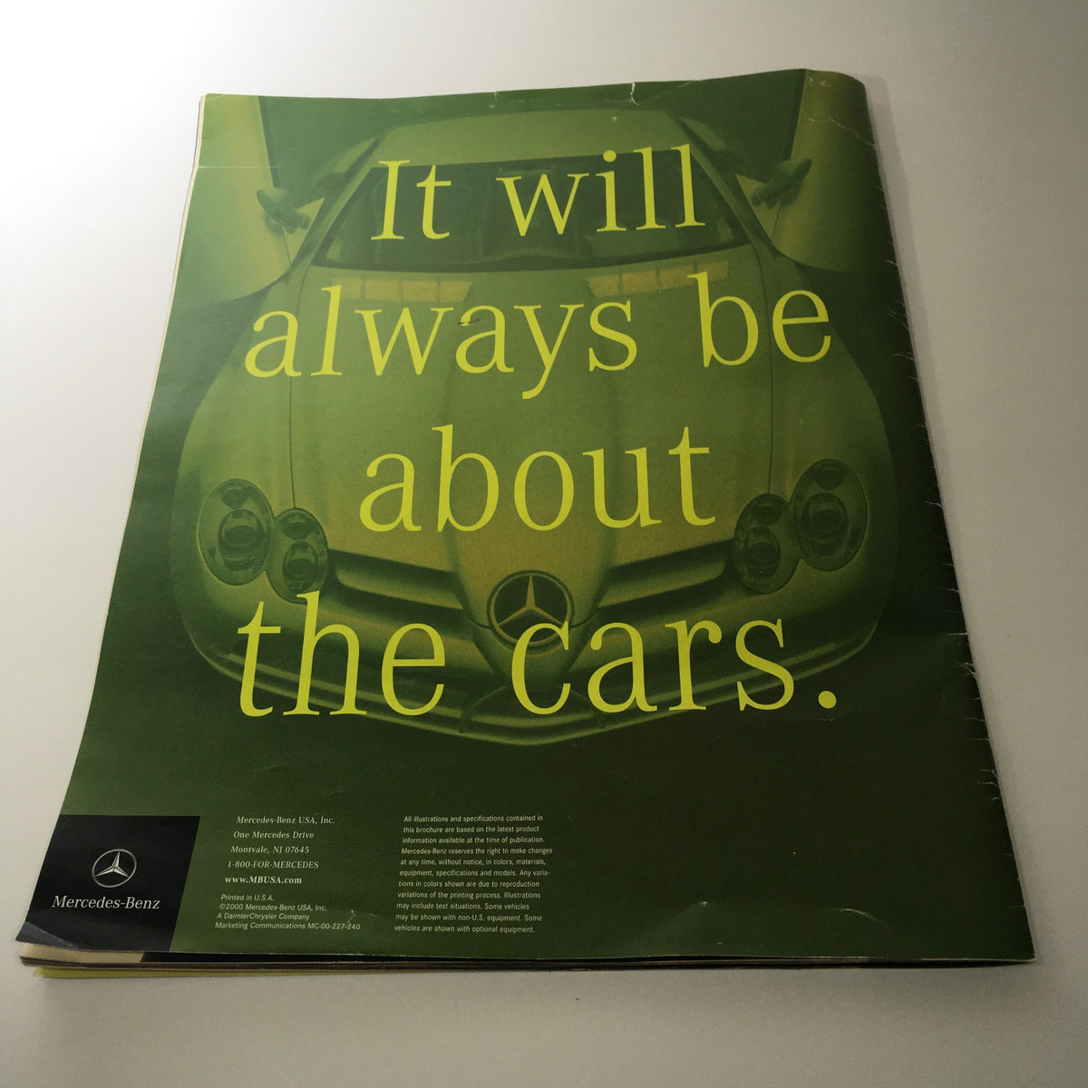 2000 Mercedes-Benz CLK-Class S-Class Dealership Catalog Brochure cover with the text 'It will always be about the cars' and a vibrant visual of a Mercedes model.