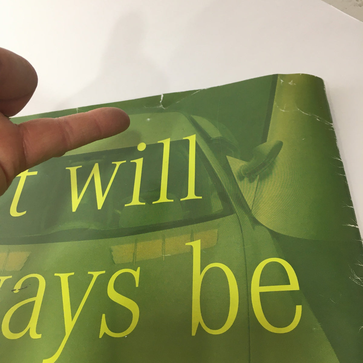 Close-up of the 2000 Mercedes-Benz CLK-Class S-Class Dealership Catalog Brochure showing minor damages and creases on the cover.