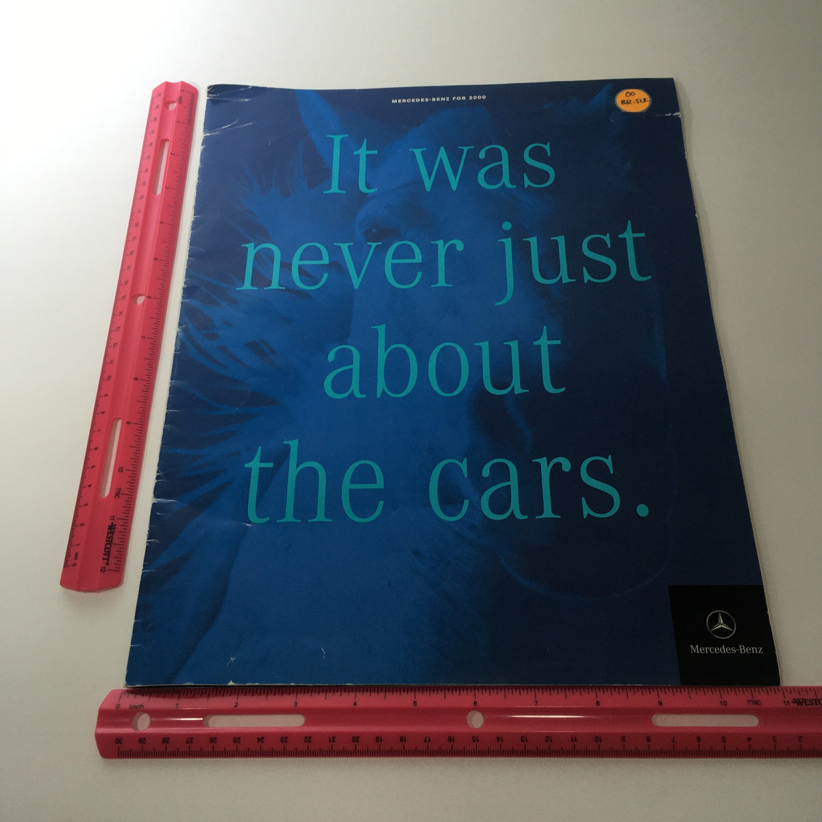 Cover of the 2000 Mercedes-Benz CLK-Class S-Class Dealership Catalog Brochure featuring the phrase 'It was never just about the cars' and measuring tools for size reference.