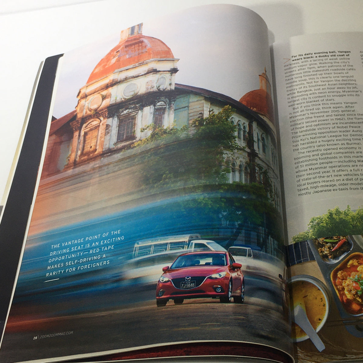Spring 2016 Mazda RX-Vision CX-9 Debuts dealership car catalog brochure showcasing a Mazda vehicle in an urban setting, capturing the excitement of the brand's presence.