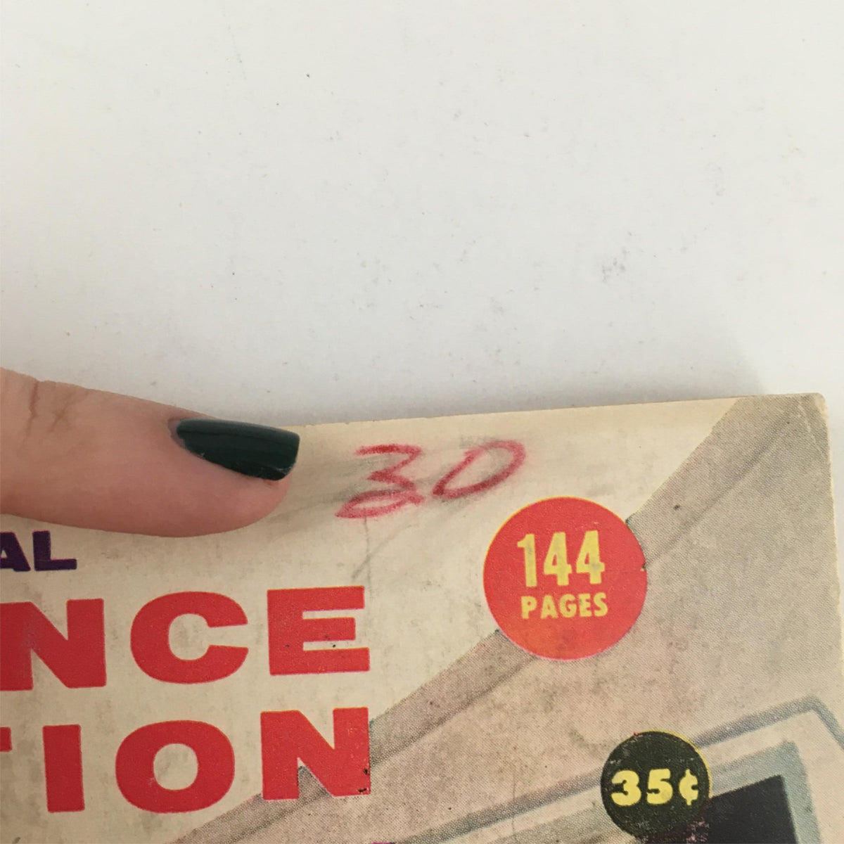 Close-up shot of The Original Science Fiction Stories March 1957 magazine cover showing handwritten price, page count details, and vintage design features. Ideal for collectors and sci-fi enthusiasts.