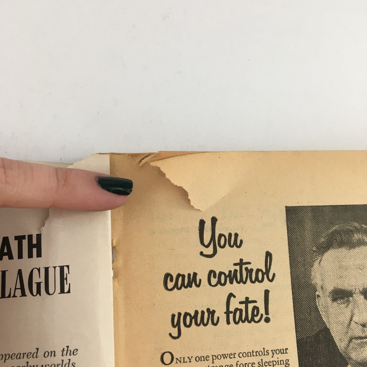 Interior page of Fantastic Science Fiction, Fantasy Stories July 1961, showcasing an advertisement and a corner tear, related to the story 'The Creator'.