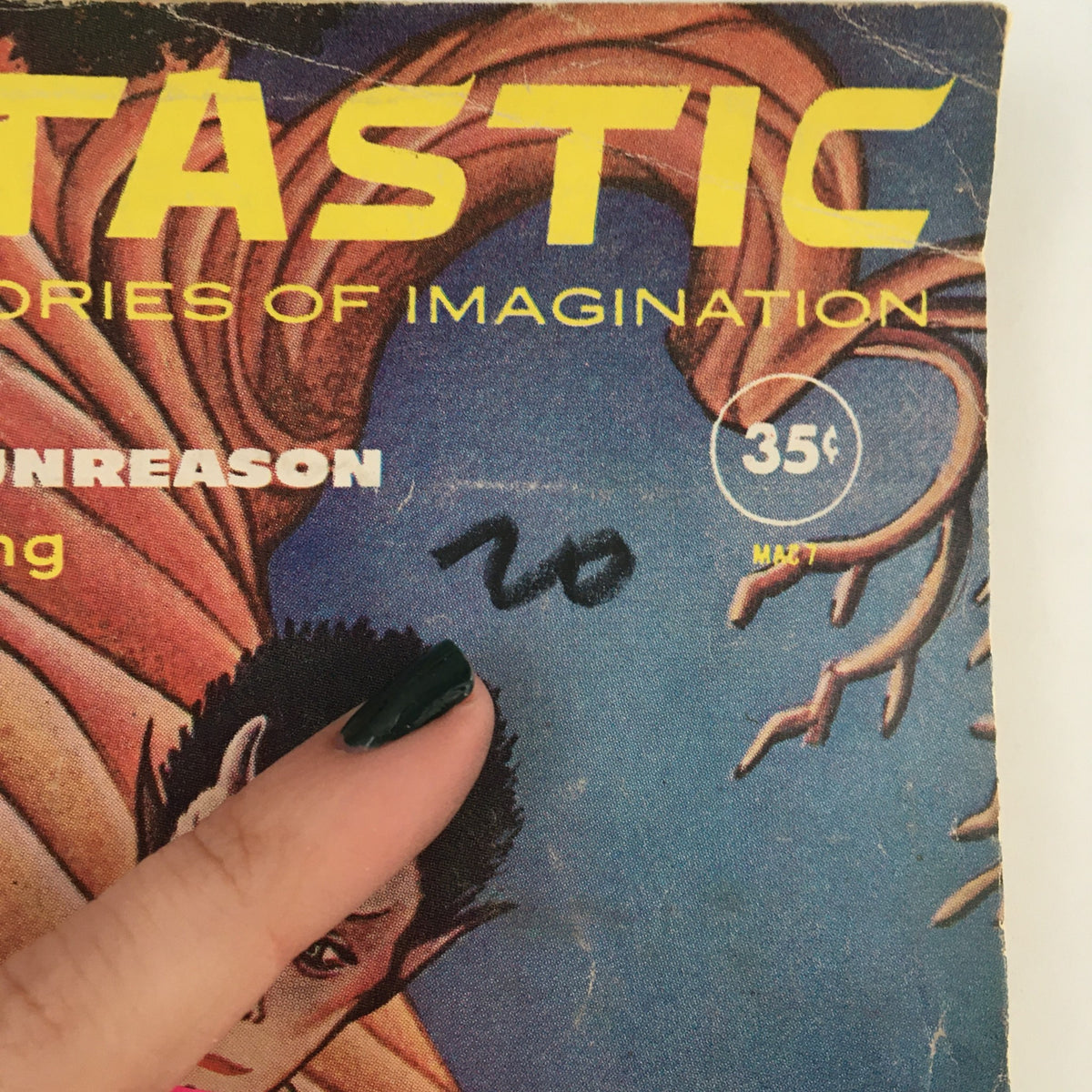 Detail of the cover of Fantastic Science Fiction, Fantasy Stories July 1961, noting scuff marks and price, focusing on 'The Creator' by Clifford Simak.