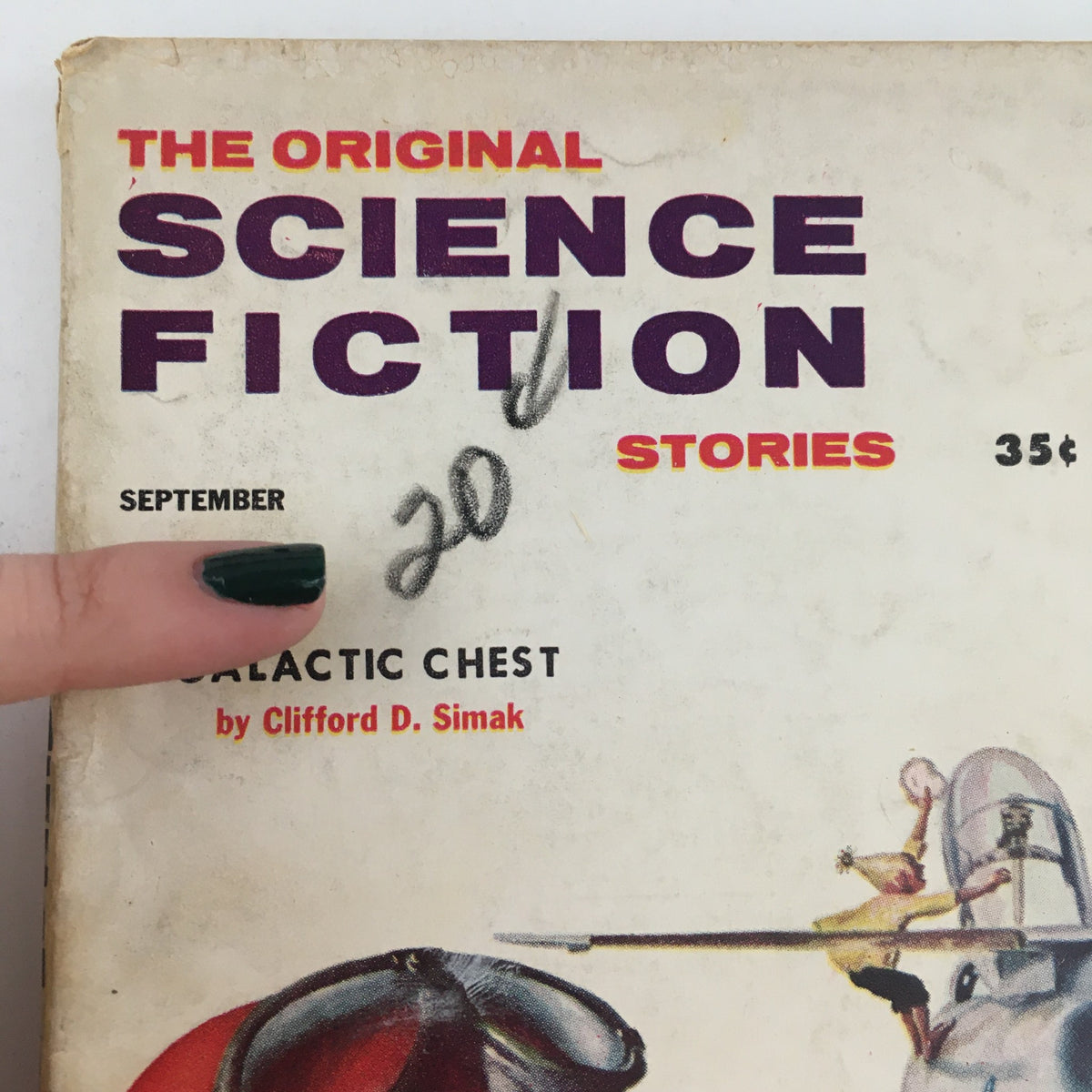 Close-up of the cover of The Original Science Fiction Stories September 1956 Vol 7 #2 'Galactic Chest' indicating the date and price, highlighting the vintage design.