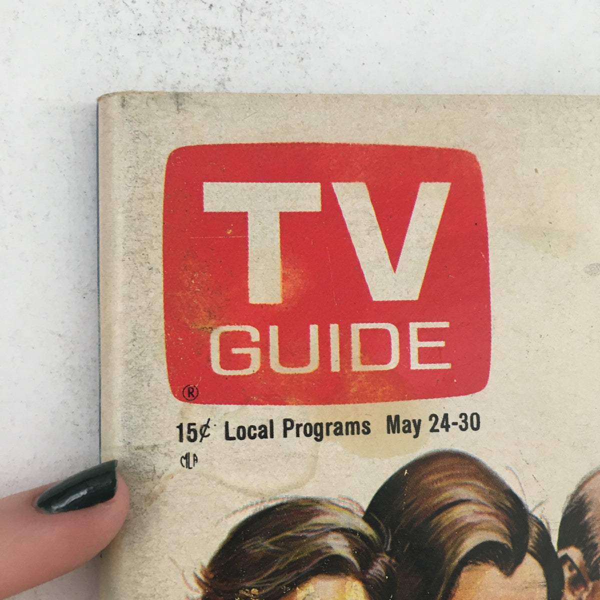 Close-up of the TV Guide May 24 1969 logo and price, displaying the 15 cents label and local programs highlight.