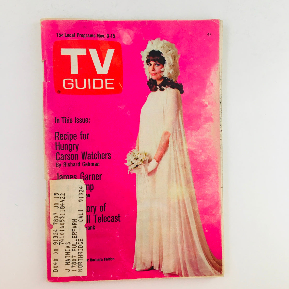 TV Guide November 9 1968 Vol 16 #45 featuring a vintage magazine cover with a striking pink background and an elegant image of a woman in a white dress, likely Barbara Feldon, known for her role in 'Get Smart.' This edition includes features on popular shows of the era and is a collectible item for television history enthusiasts.