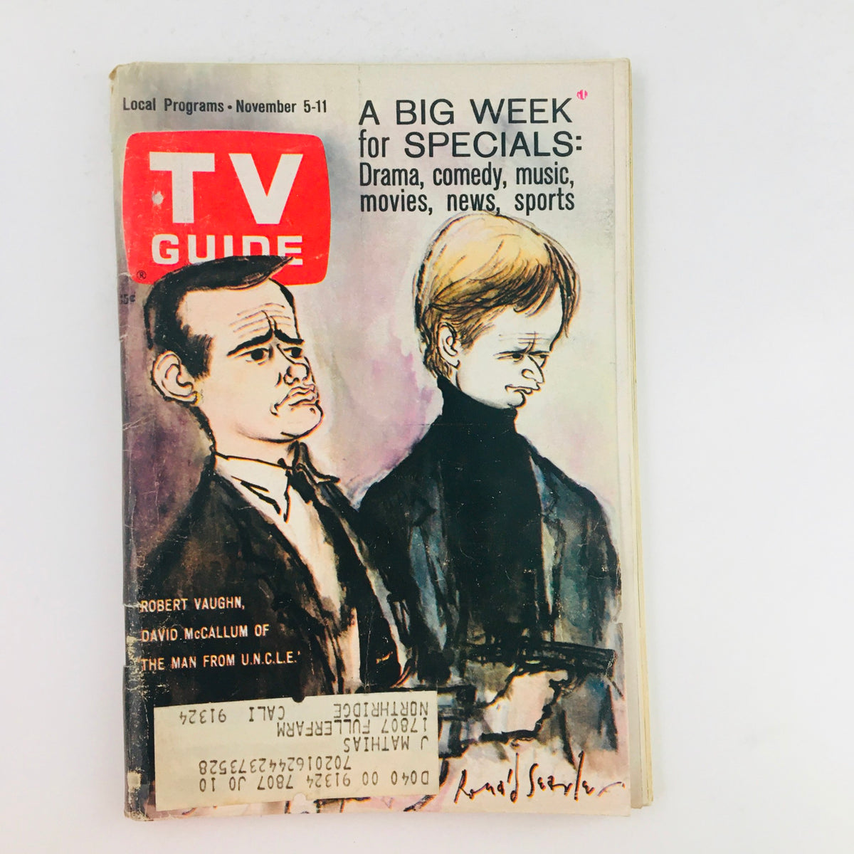Cover of TV Guide November 5 1966 Vol 14 #45 featuring caricatures of Robert Vaughn and David McCallum from 'The Man from U.N.C.L.E.', includes text about specials in drama, comedy, and music.