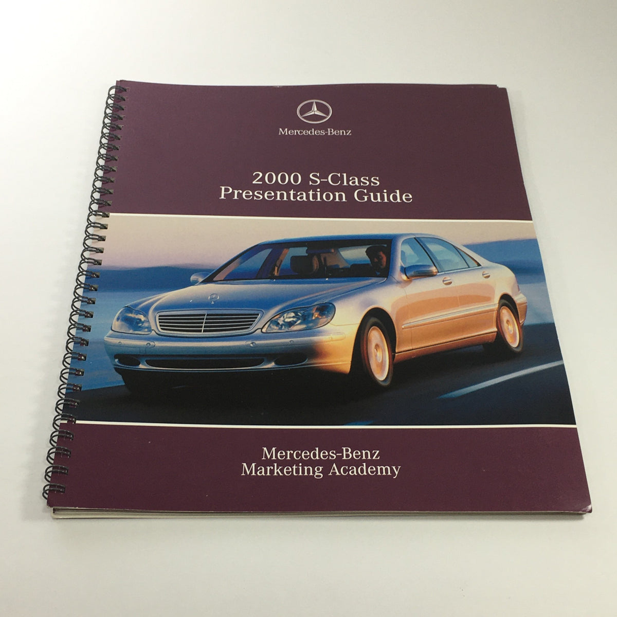 2000 Mercedes-Benz S-Class Presentation Guide cover showcasing luxury vehicle design from the Marketing Academy.