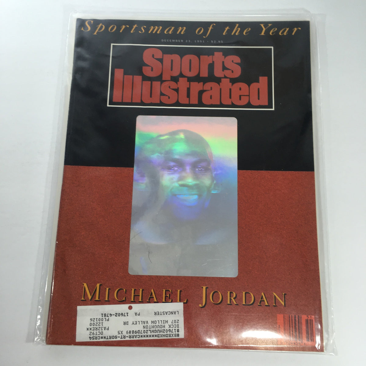 Sports Illustrated magazine cover from December 23, 1991, featuring Michael Jordan as Sportsman of the Year. The cover displays a portrait of Jordan with a holographic effect and highlights his significance in sports history.