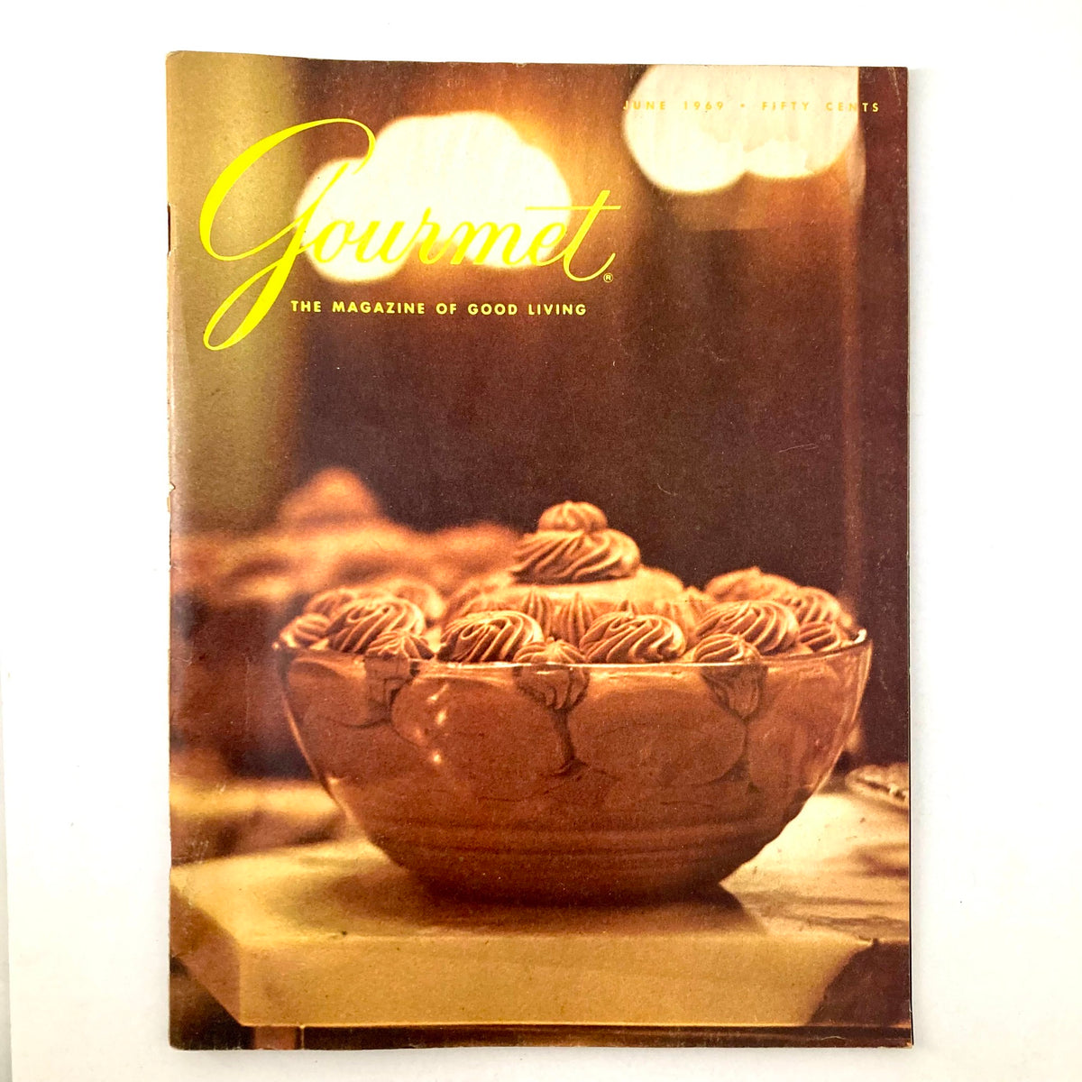 Gourmet Magazine June 1969 cover featuring a chocolate dessert in an elegant bowl, showcasing the title and vintage aesthetic.
