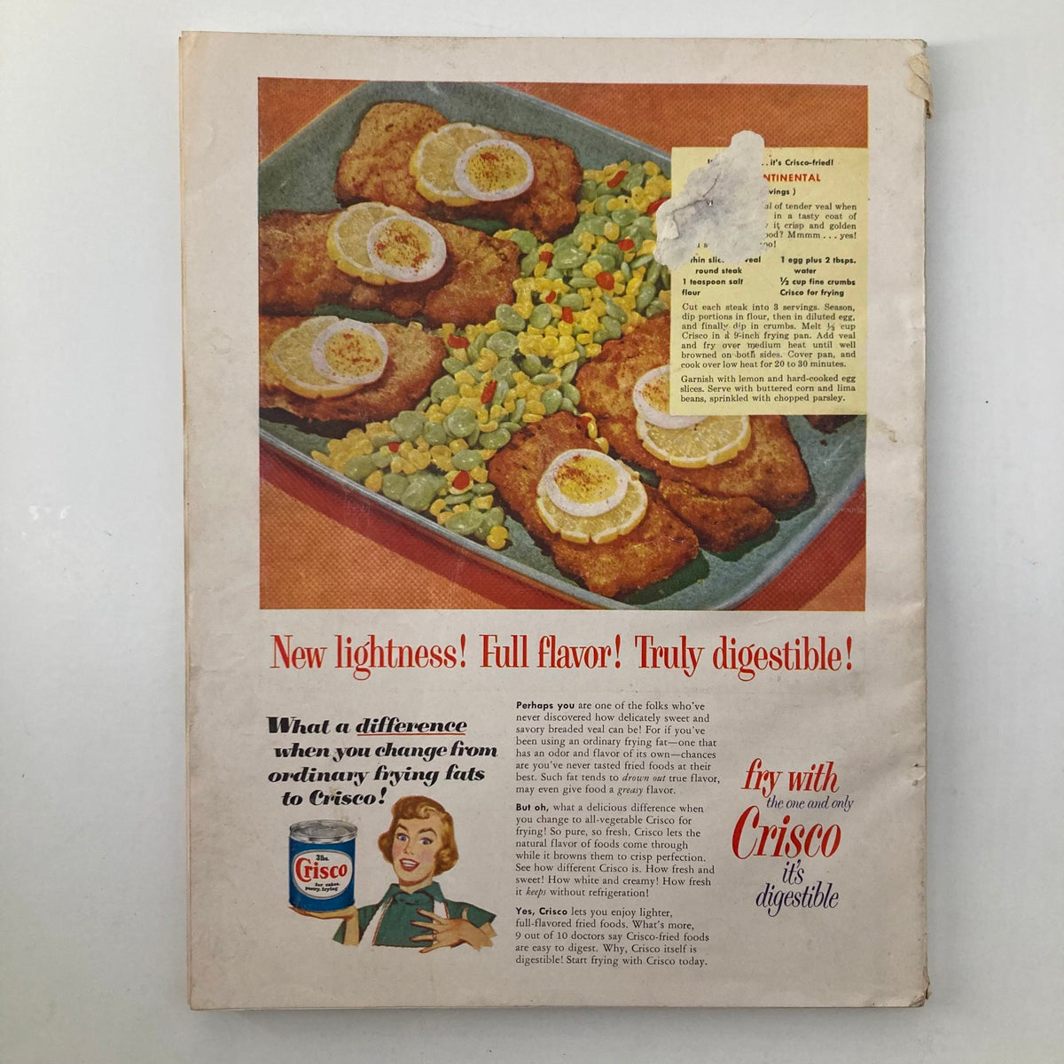 Vintage advertisement for Crisco from the VTG Good Housekeeping Magazine December 1951 Christmas Issue, featuring a vibrant plate of breaded fried fish with peas and corn, promoting light and digestible cooking.