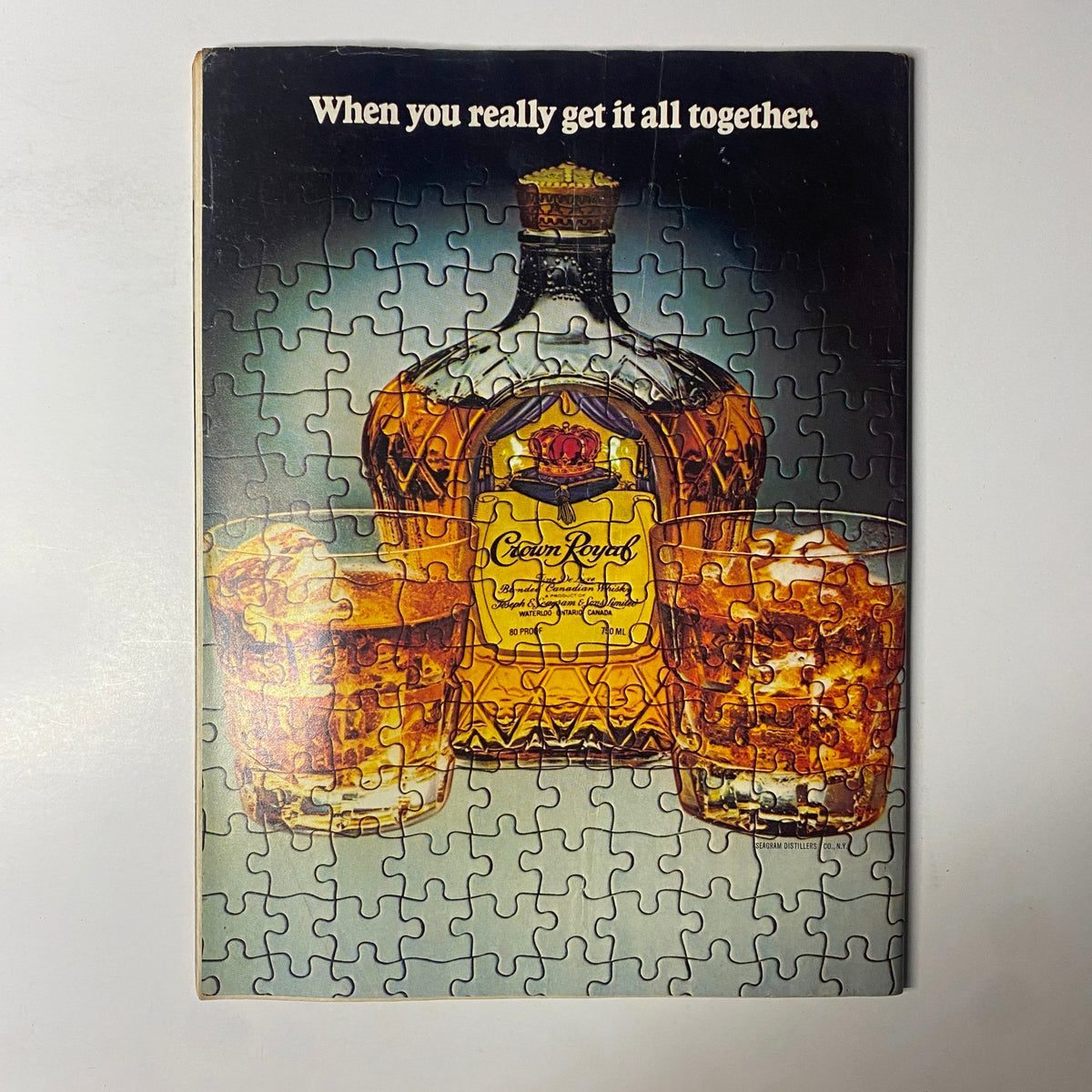 Adverting puzzle image from Forbes Magazine August 3, 1981, showcasing Crown Royal whiskey with the tagline 'When you really get it all together.'