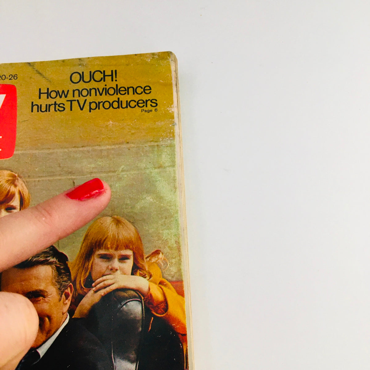 Close-up of the cover of TV Guide June 20 1970 featuring John Forsythe and Joyce Menges, pointing to the article 'Ouch! How nonviolence hurts TV producers'.