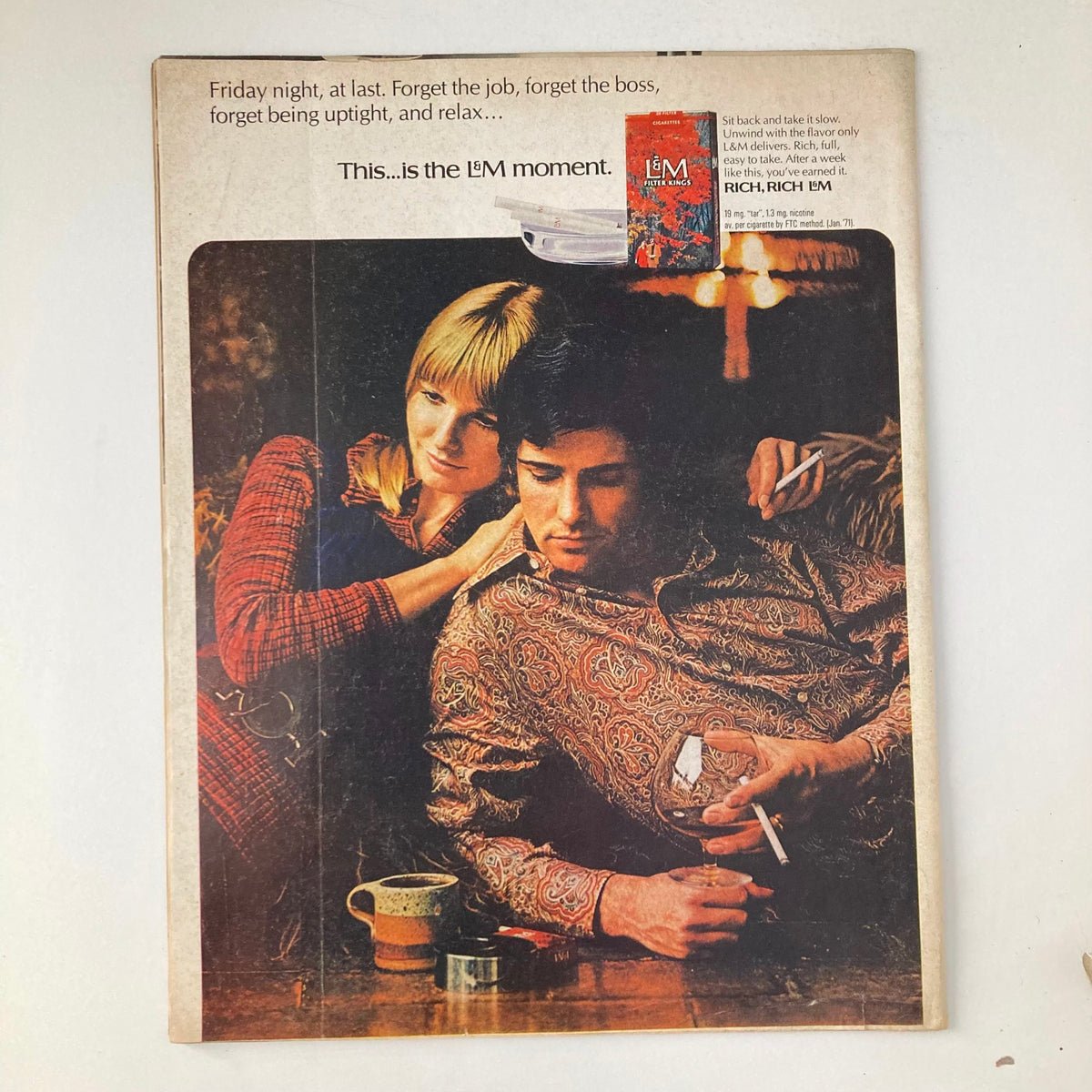 VTG Life Magazine April 16 1971 featuring a vintage advertisement with a couple relaxing together. The image captures a nostalgic moment from the 1970s, reflecting the era's style and culture.