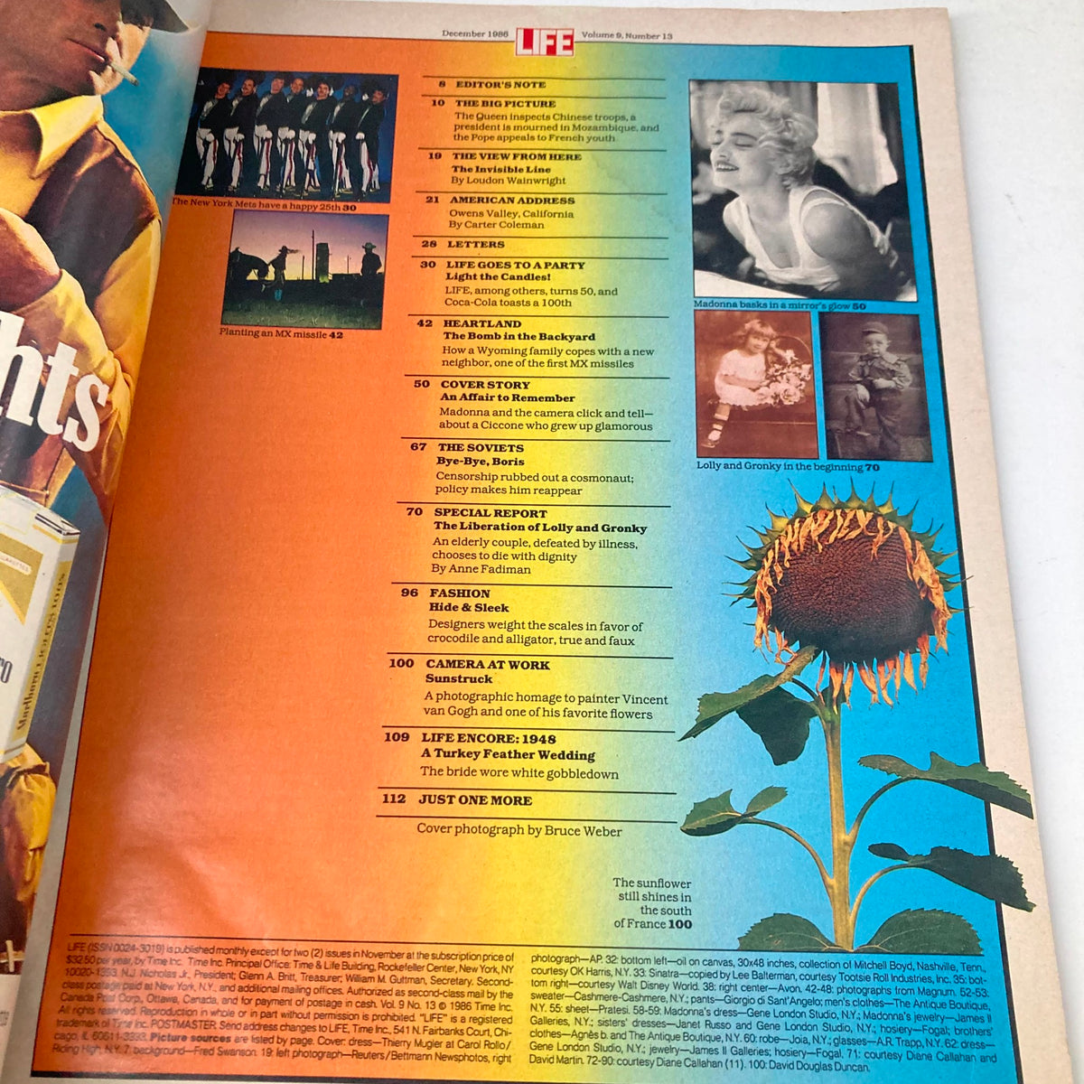 Interior page of VTG Life Magazine December 1986, Vol 9 No. 13 featuring a colorful layout with articles and a photo of Madonna, showcasing pop culture highlights.