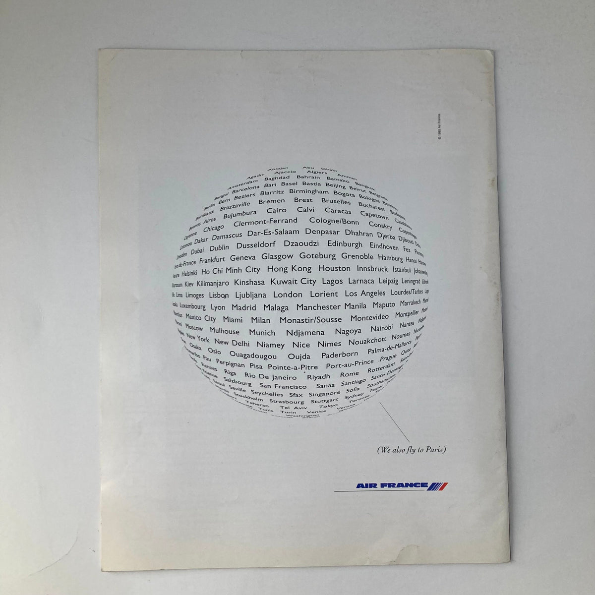 Back cover of France Magazine Spring 1995 No. 34 showcasing a collection of city names, emphasizing global connectivity with Air France branding.