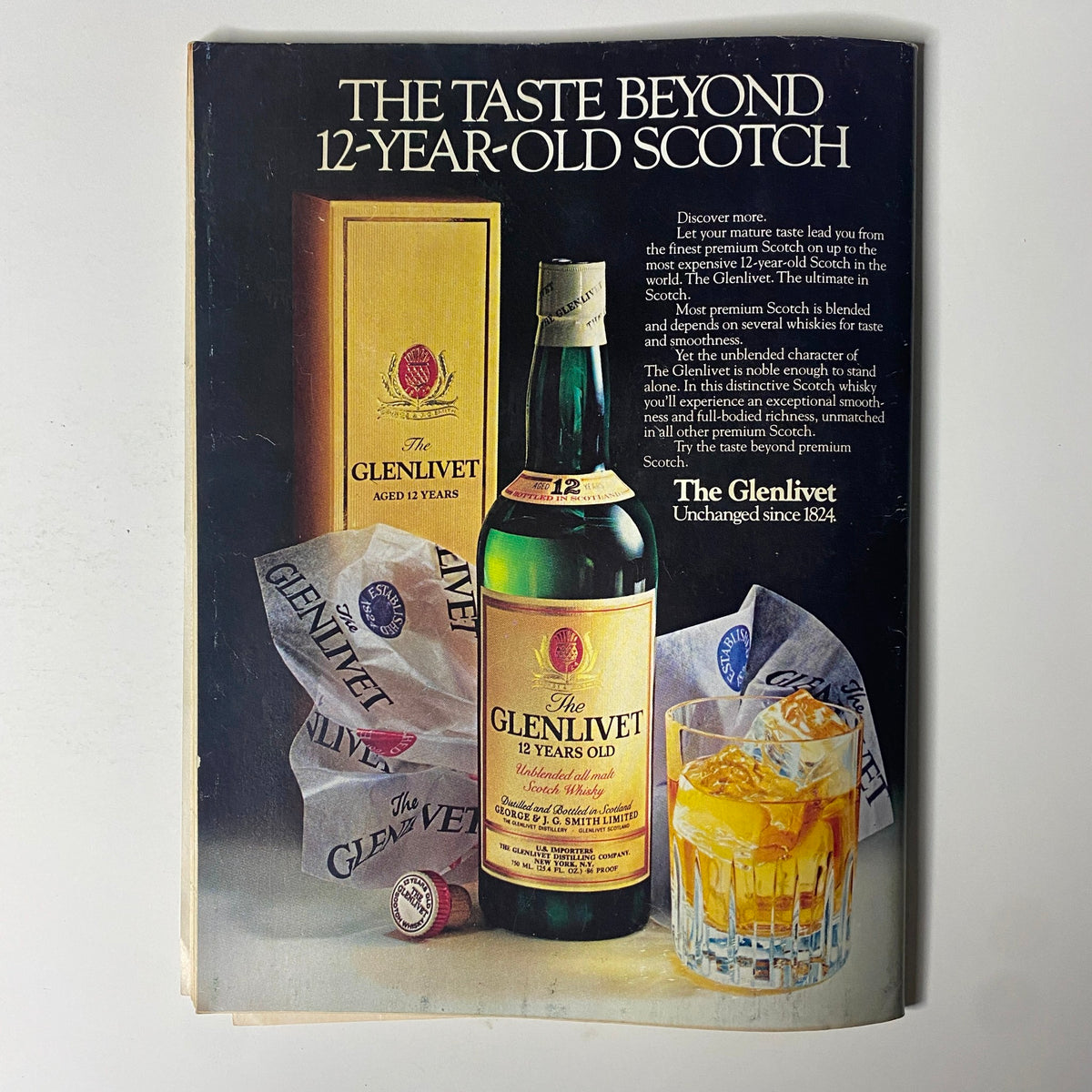 Vintage advertisement for The Glenlivet 12-Year-Old Scotch, featuring a bottle and packaging with the title 'THE TASTE BEYOND 12-YEAR-OLD SCOTCH'. This promotional piece emphasizes the premium quality and flavors of The Glenlivet whiskey, capturing its brand essence in a classic magazine layout.
