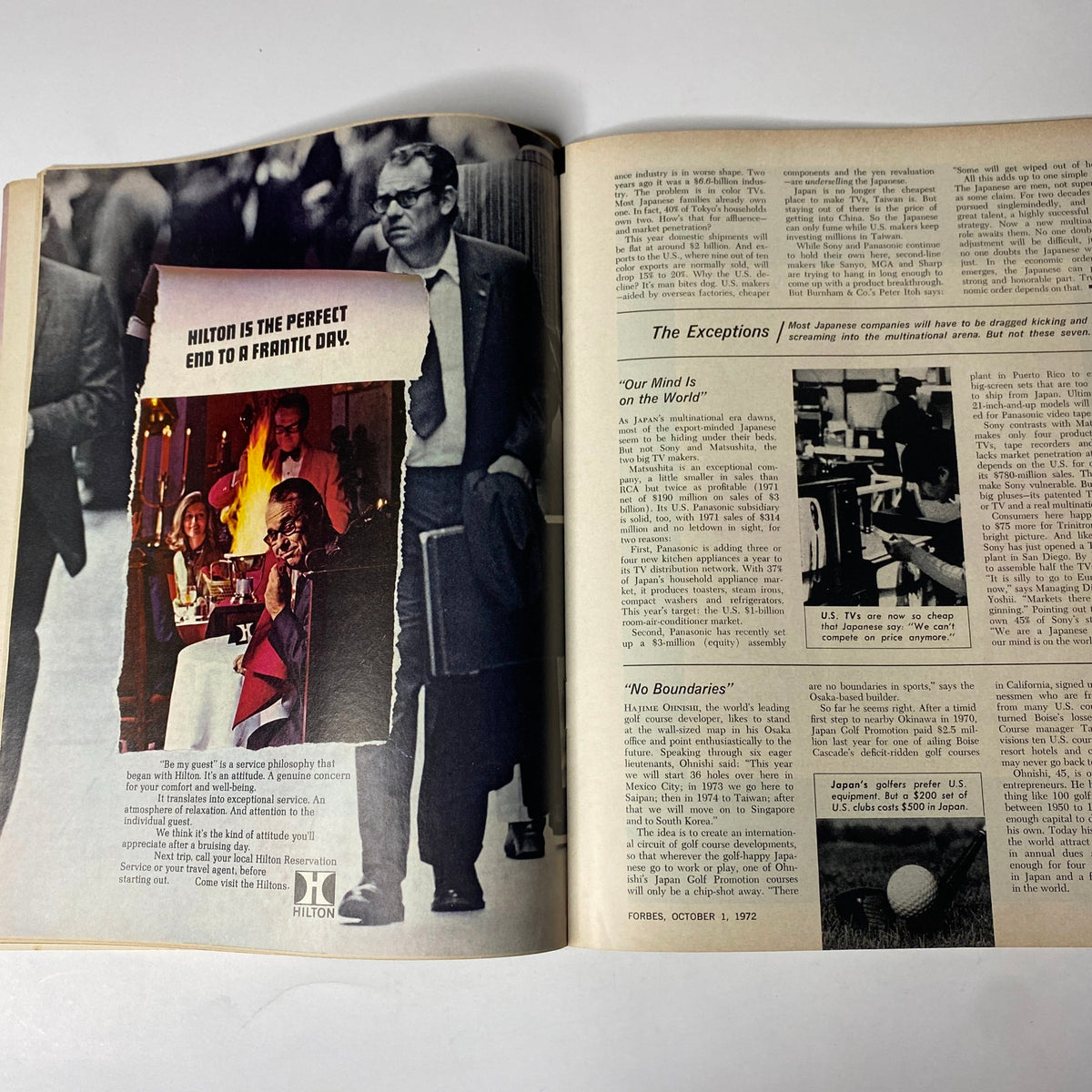 An interior spread of Forbes Magazine, October 1, 1972, featuring an advertisement for Hilton and discussing Japanese business philosophy, relevant to the theme 'Japanese Business: The Doubts Behind The Mask.'