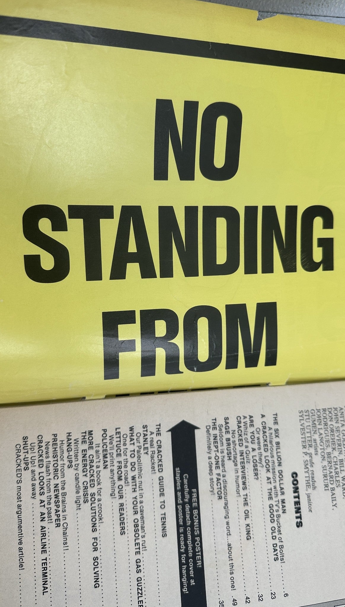 Image of a yellow sign reading 'NO STANDING FROM' within Cracked Magazine No. 120, October 1974, presented alongside the Table of Contents.