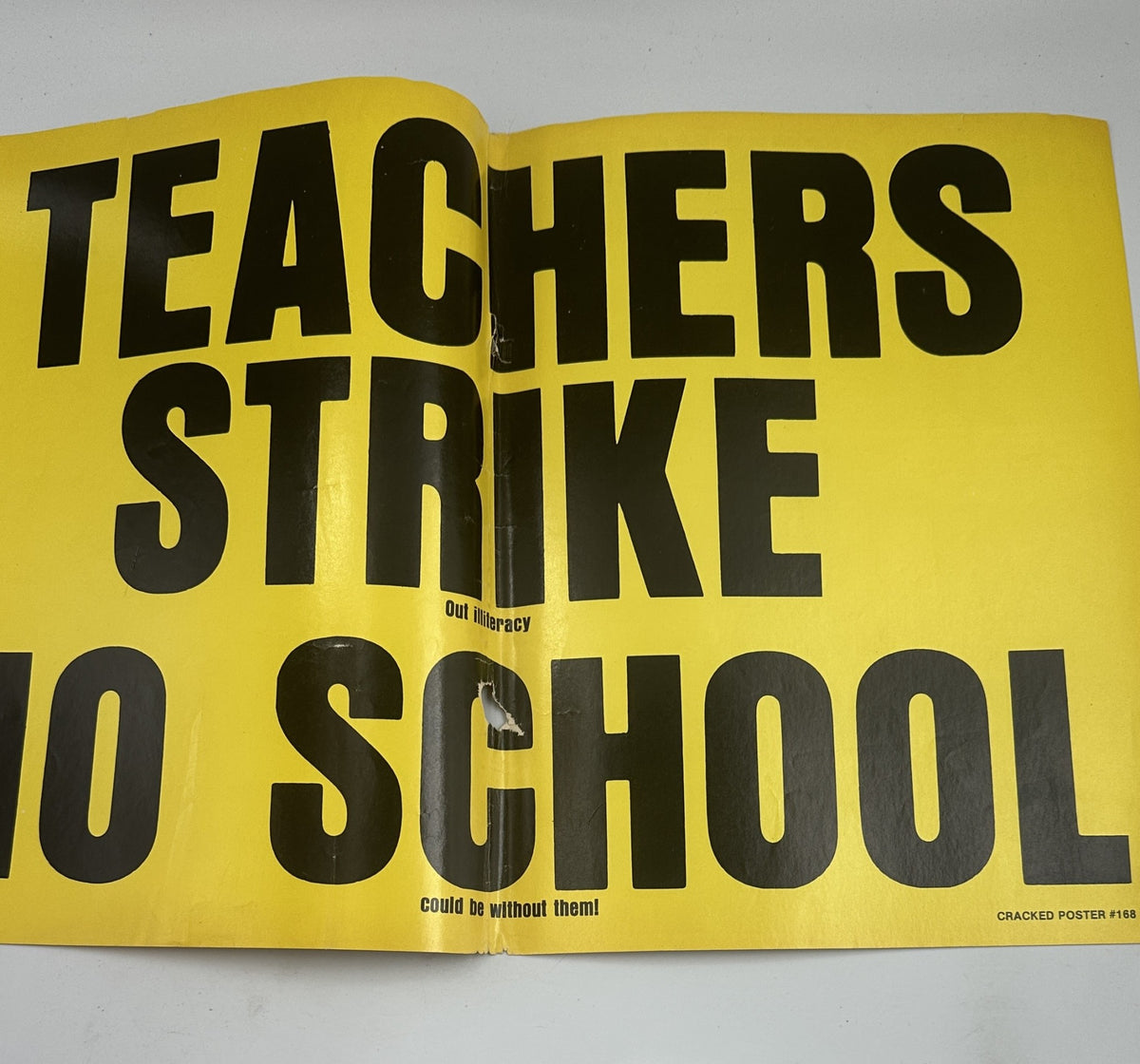 Full page poster from Cracked Magazine No. 168 stating 'TEACHERS STRIKE NO SCHOOL' in large bold letters, promoting humor about a teacher's strike.