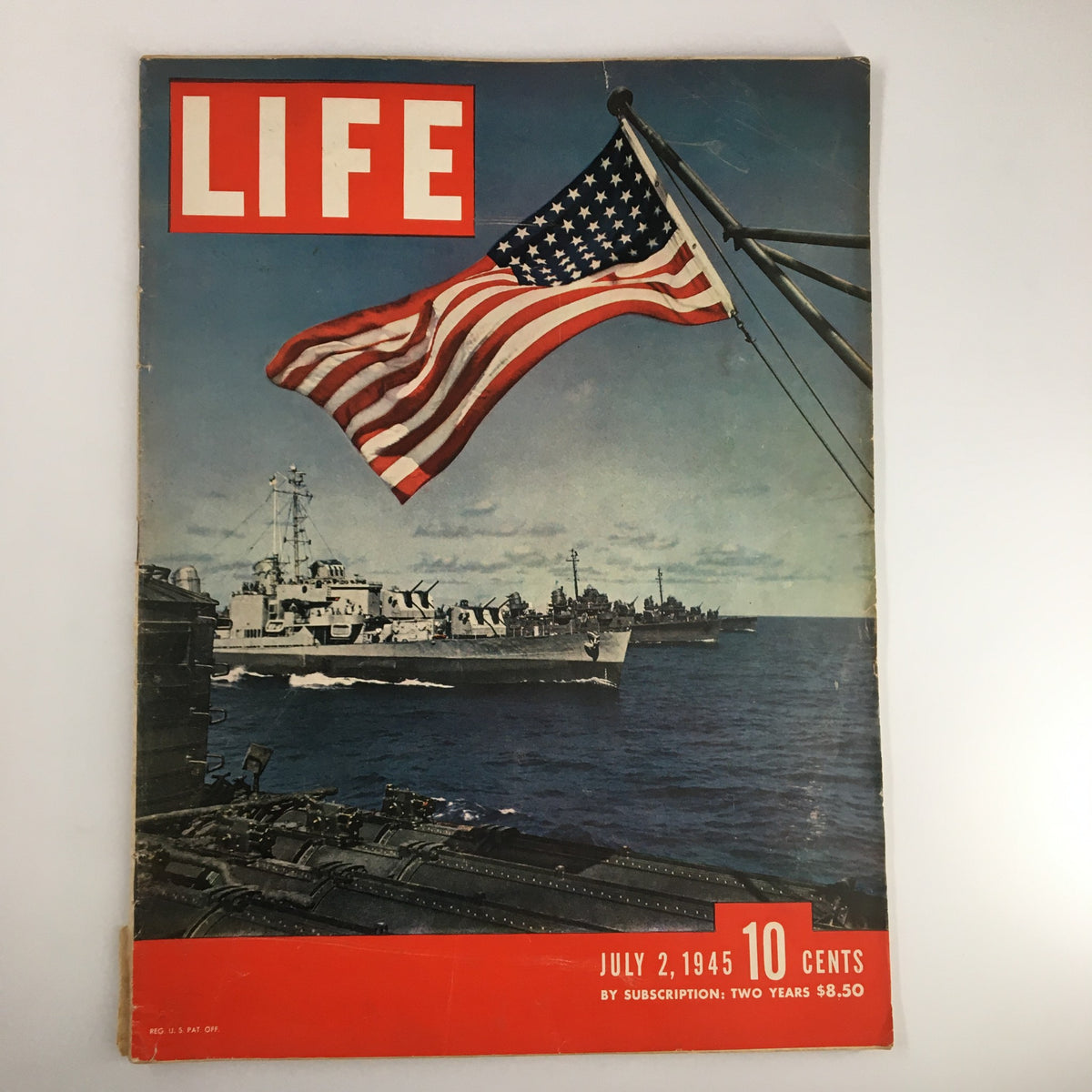 Cover of VTG Life Magazine July 2, 1945 featuring a Navy ship and the American flag, capturing a historical moment from World War II.